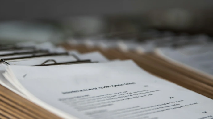 restaurant menus on clipboards close up
